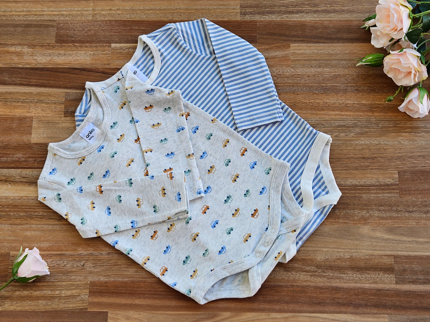  2 Long sleeve rompers, blue stripped and grey car print rompers size 6-12 months