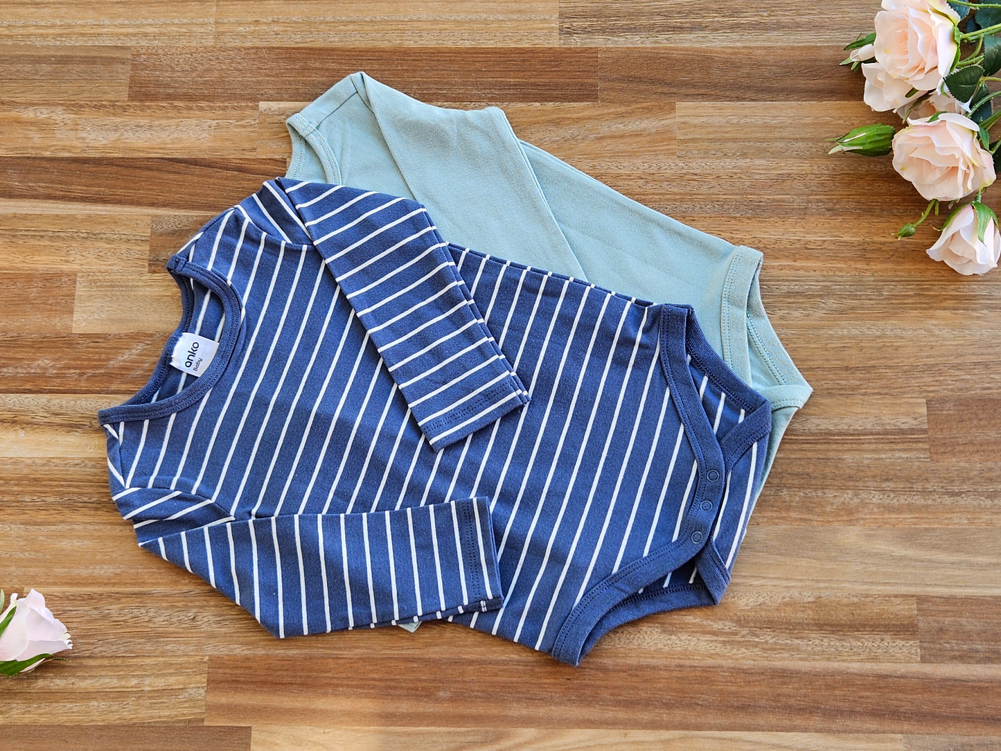 2 Long sleeve rompers, blue stripped and plain green  rompers size 6-12 months