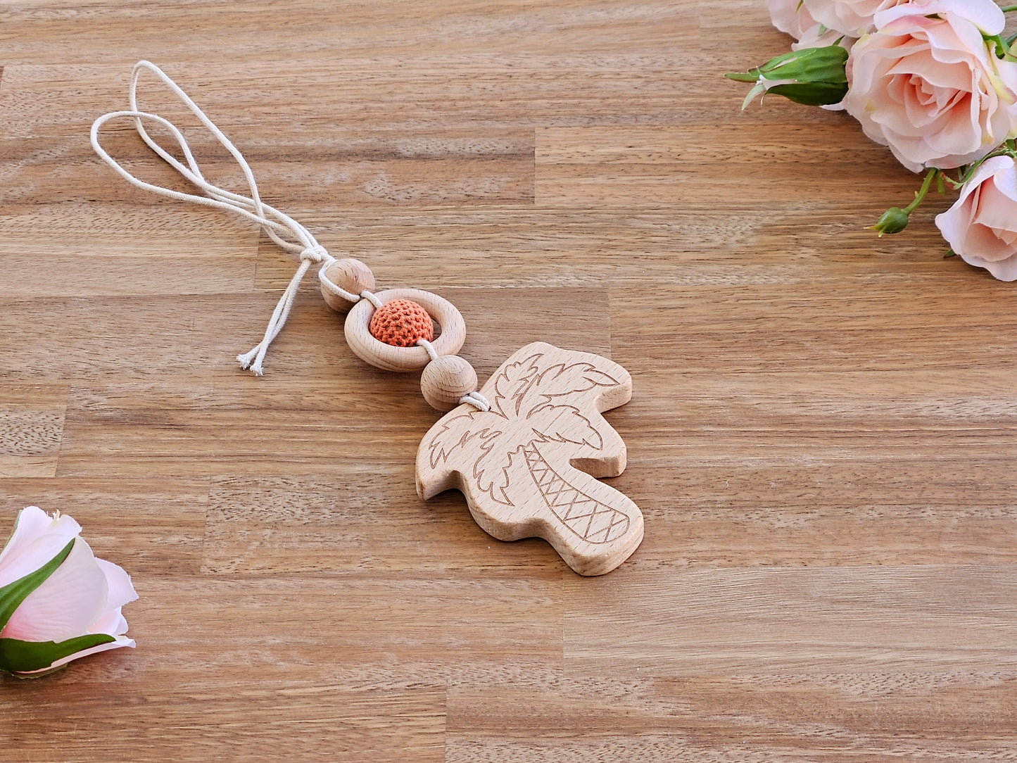 Beaded hanging toy with wooden palm tree