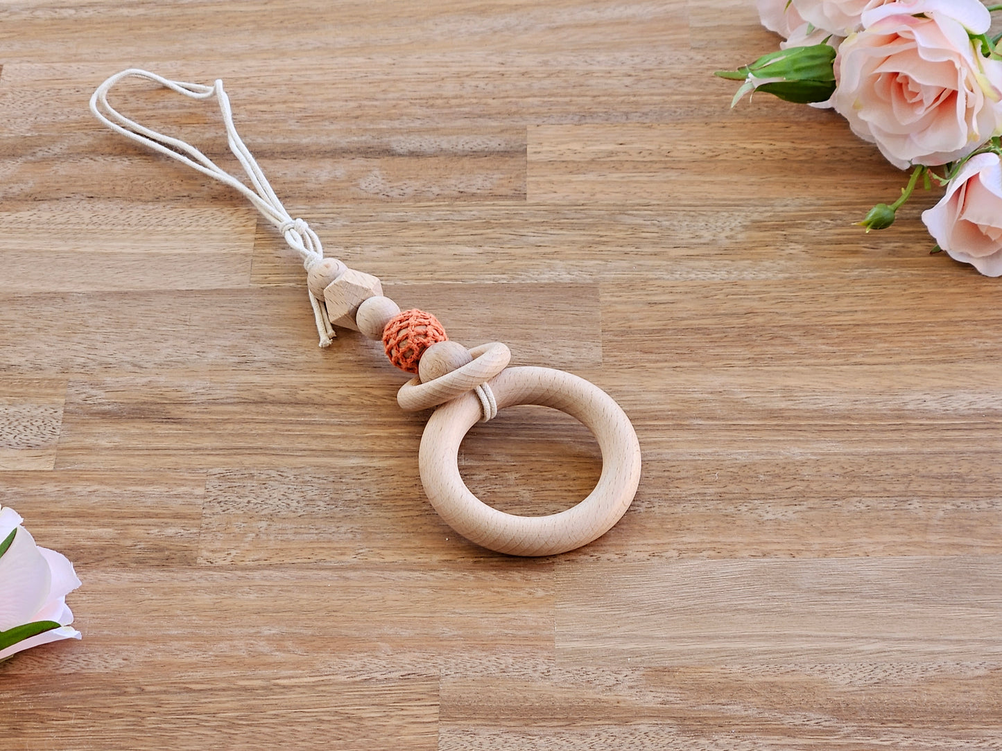 beaded hanging toy with wooden ring