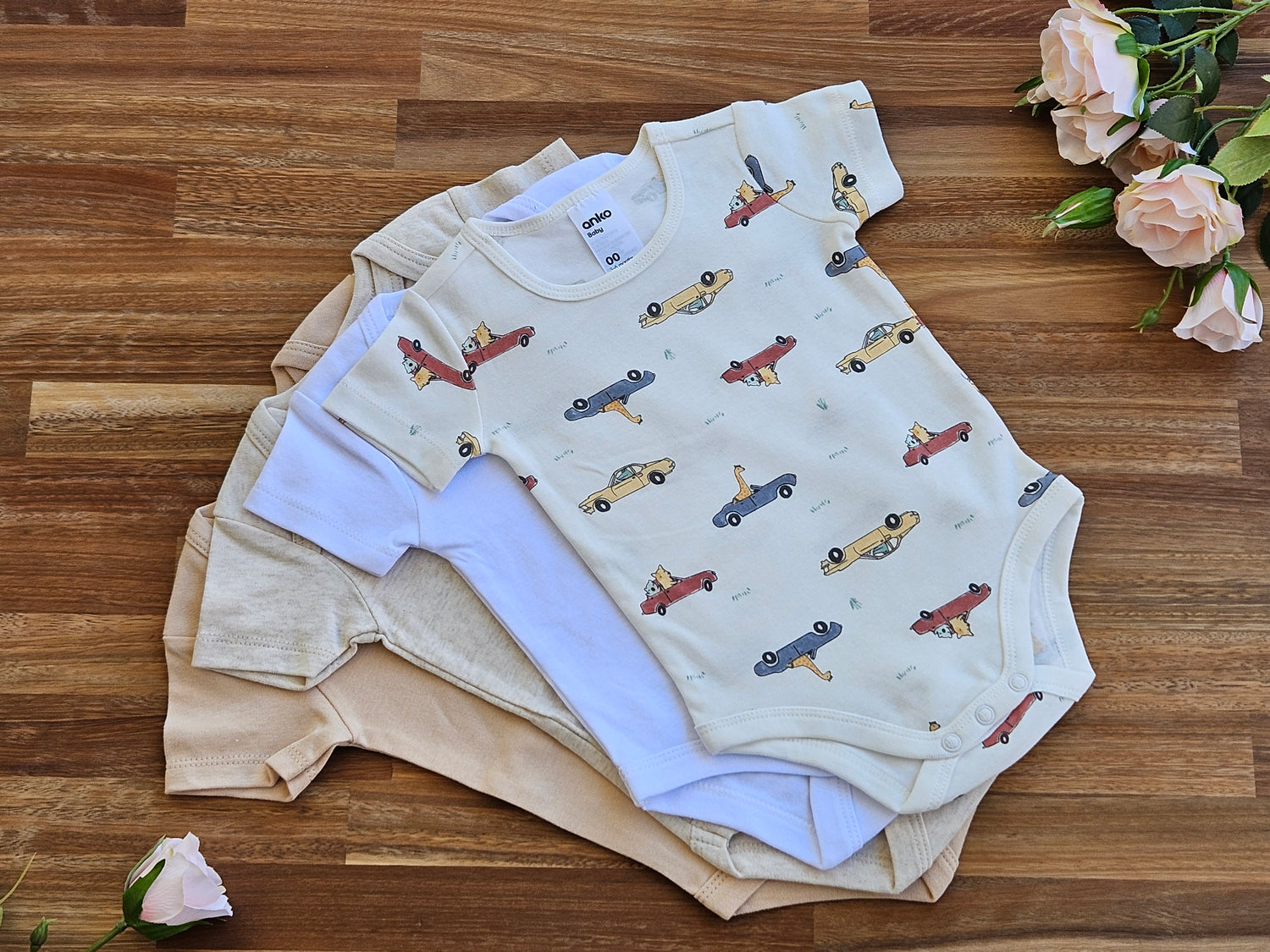 4 Rompers 3 plain 1 car print