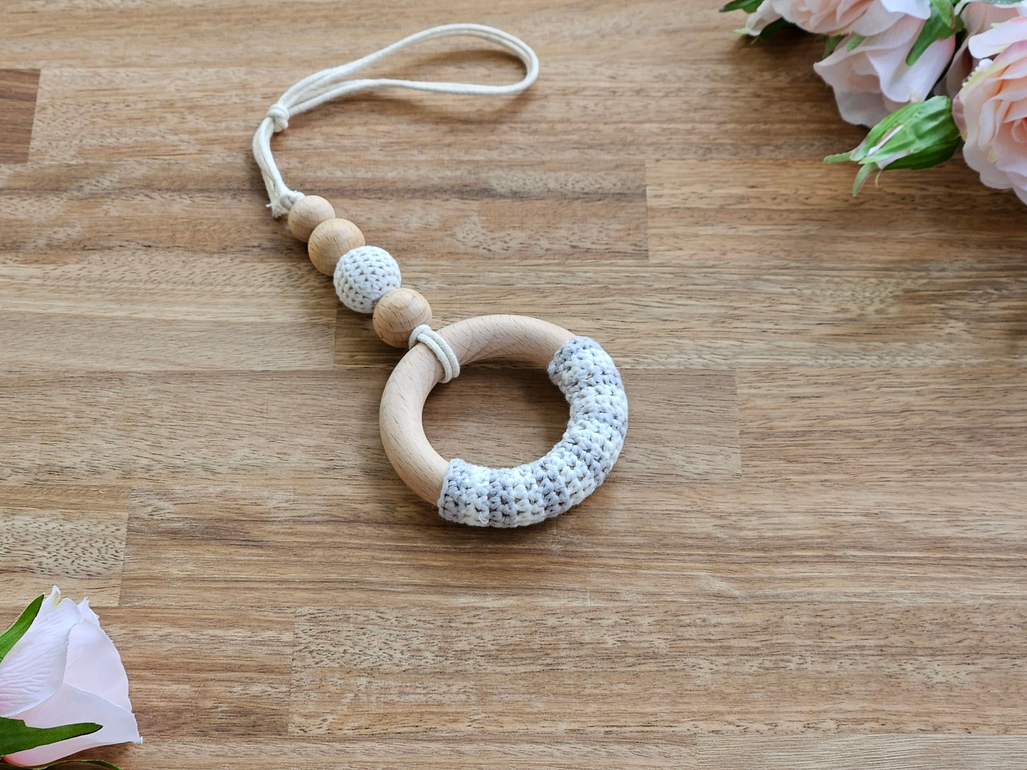 Beaded hanging toy with crocheted ring