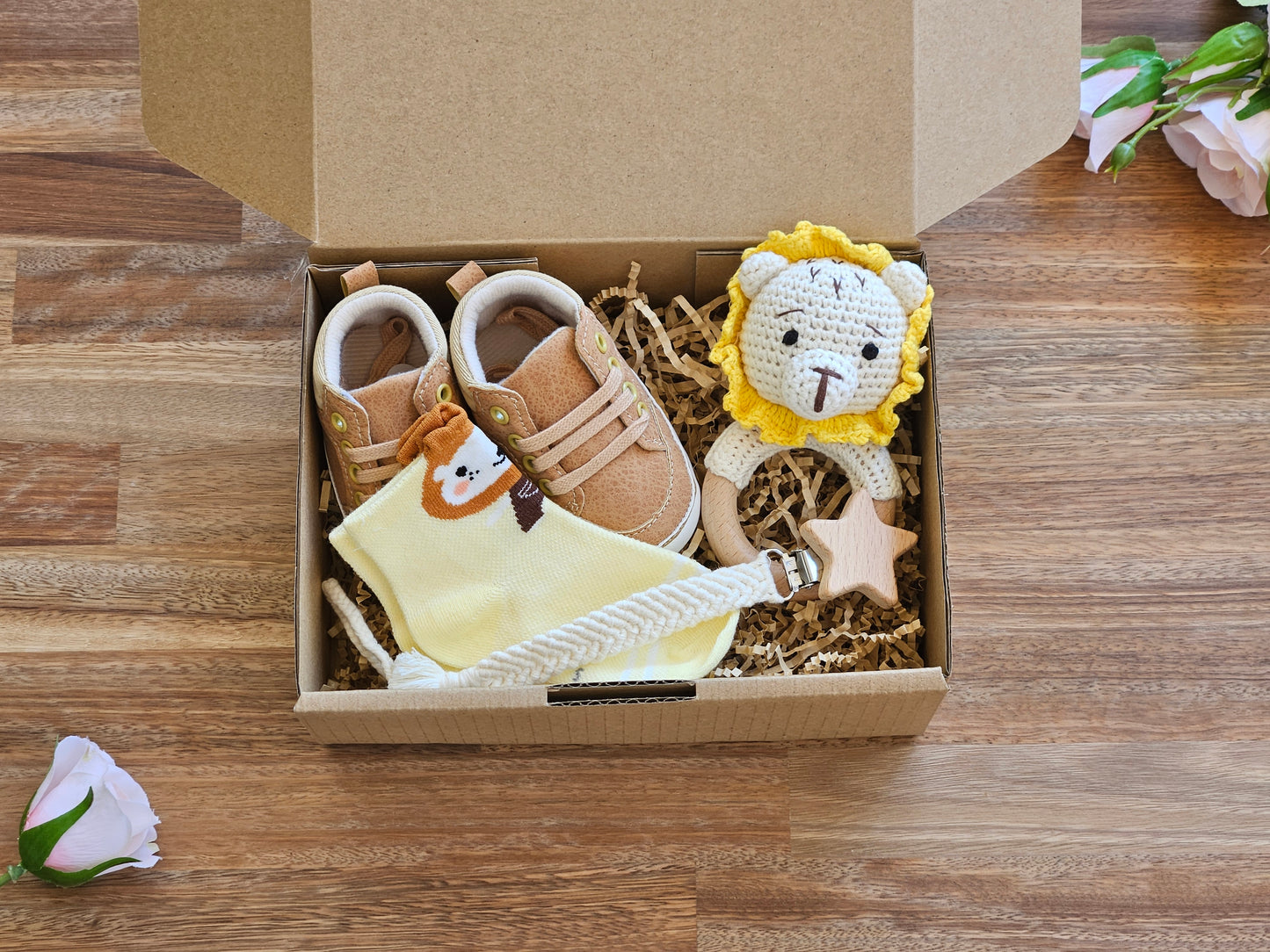 Baby gift box with High top baby boot, crocheted lion rattle, Lion sock and a macramé pacifier chain