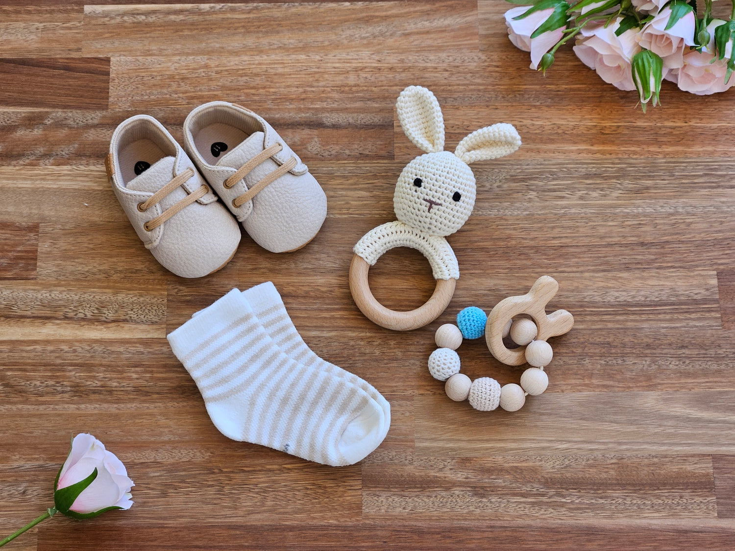 Beige lace up shoe, Bunny rabbit rattle, beaded teether toy ring and stripped socks