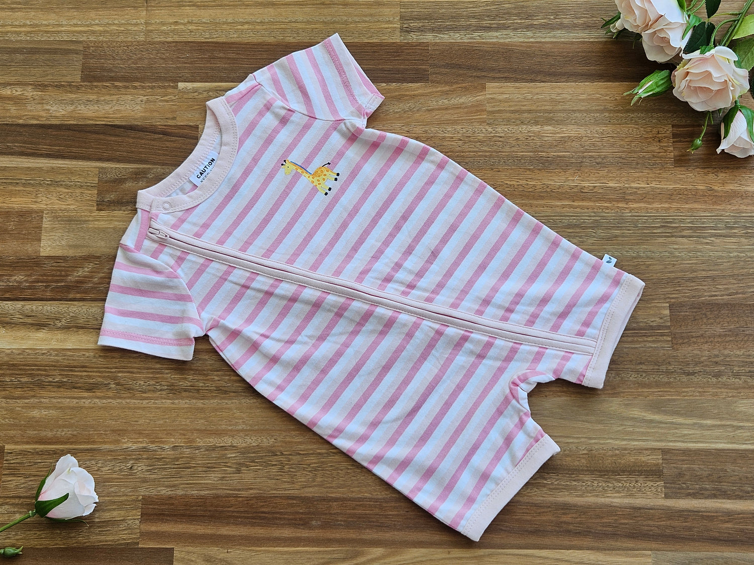 Girls pink stripe romper front