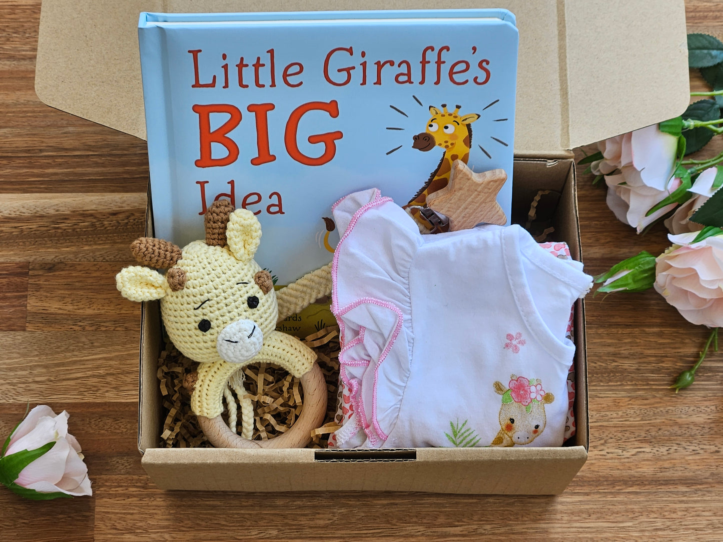 BABY GIFT BOX - Girls pink and wite romper, crochet giraffe rattle, Macramé pacifier chain and a book