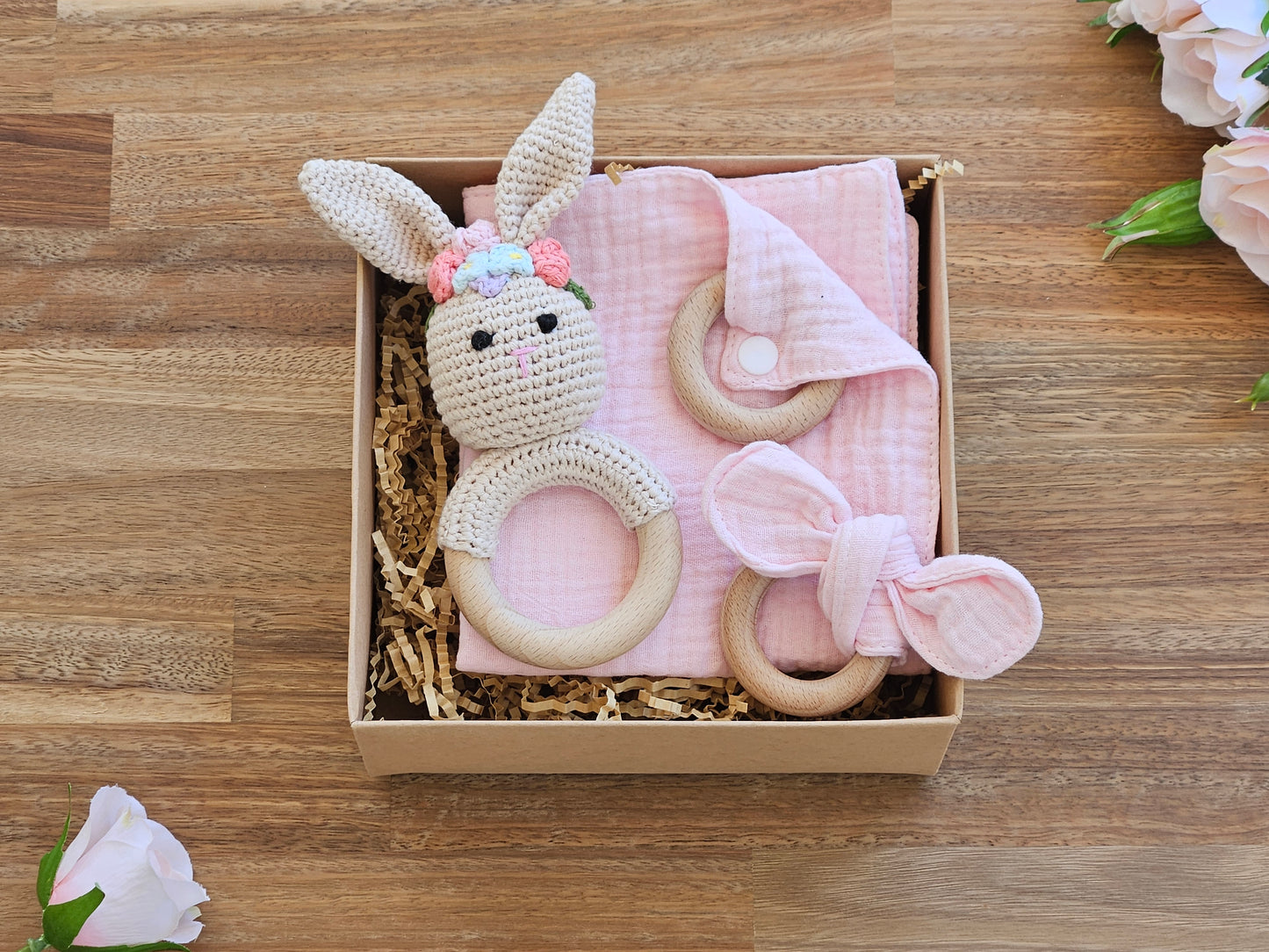 Crochet girl rabbit rattle gift box with Pink muslin dribble cloth and a bunny ear teether ring