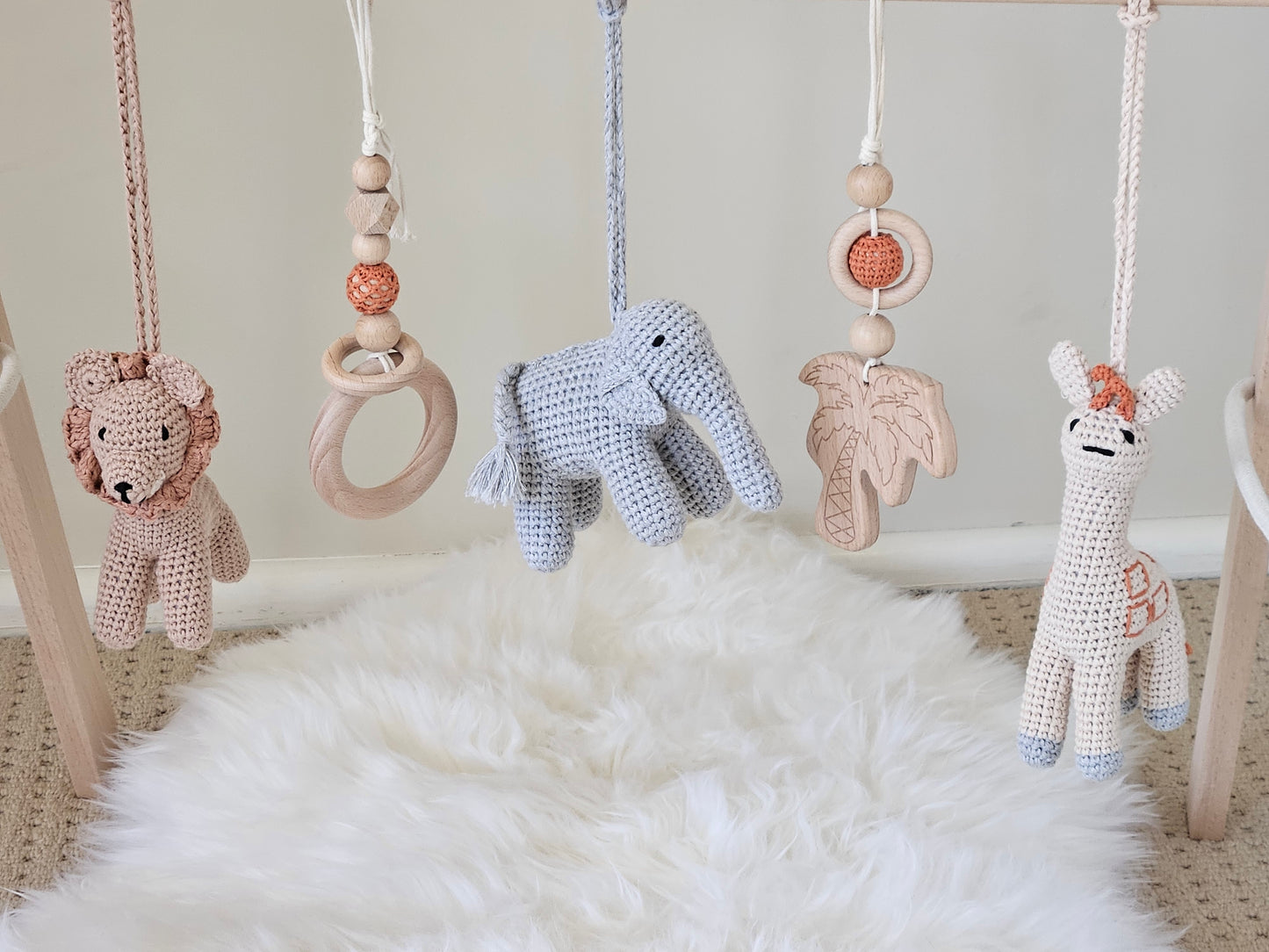 Safari themed baby gym hanging toys, Crochet beige giraffe, crochet brown lion, crochet grey elephant, 2 wooden hanging toys