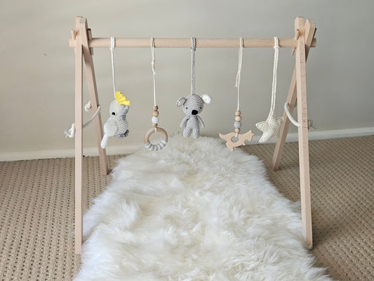 Aussie themed play gym with wooden frame, Crochet Star, crochet grey Koala, crochet Cockatoo and  2 wooden hanging toys