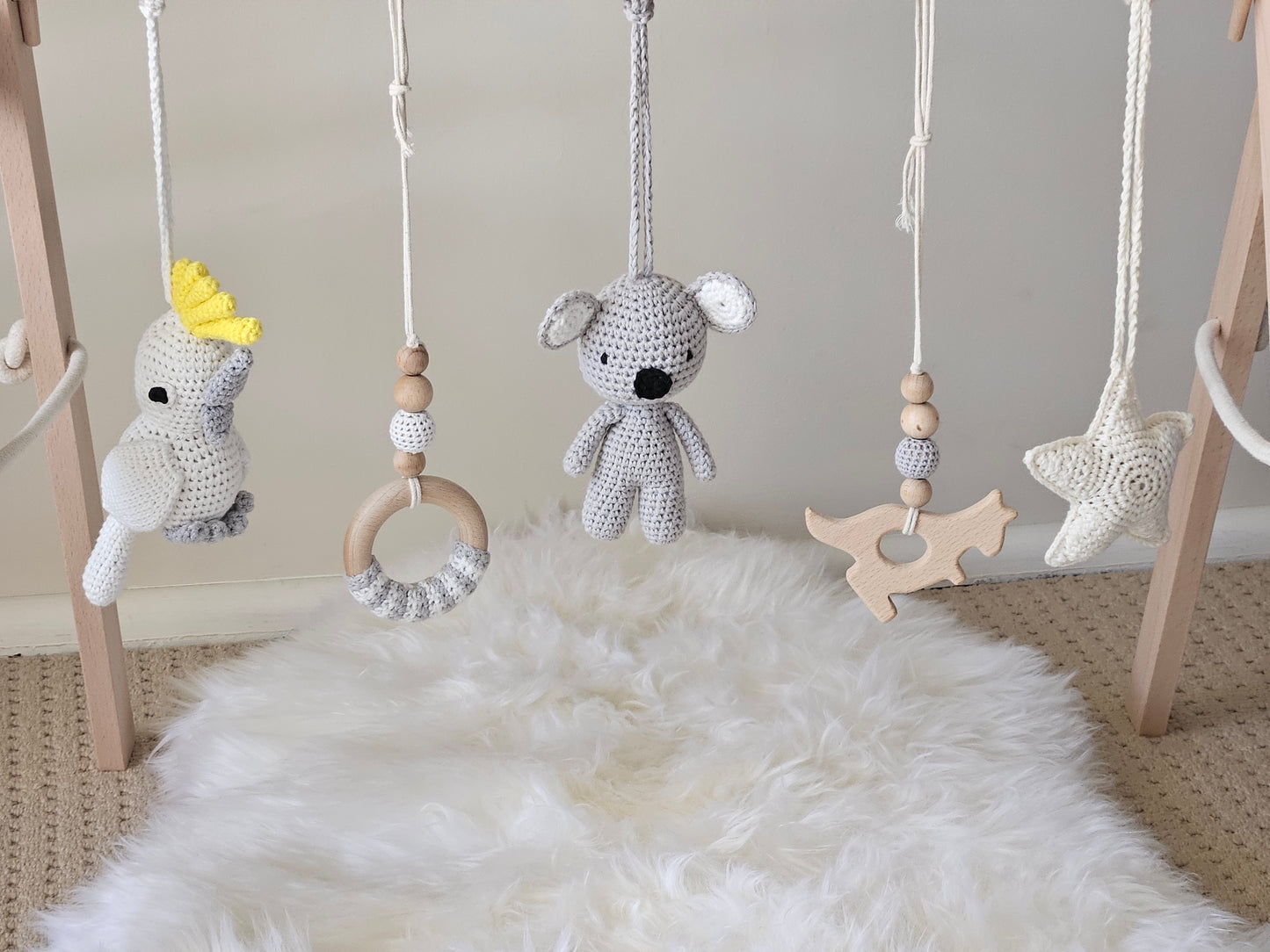 Aussie themed play gym with wooden frame, Crochet Star, crochet grey Koala, crochet Cockatoo and  2 wooden hanging toys