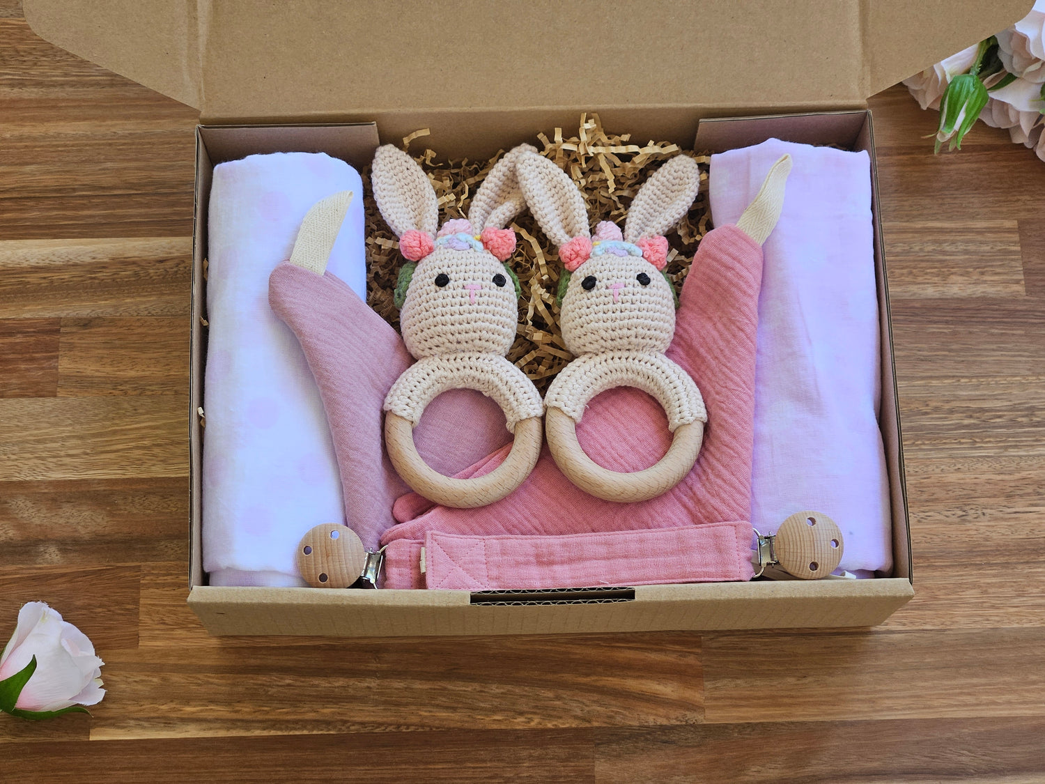 Gift box Includes
2 x Spotted Muslin wraps
2 x Girl Rabbit rattles
2 x Muslin Pacifiers
2 x Muslin drool cloth