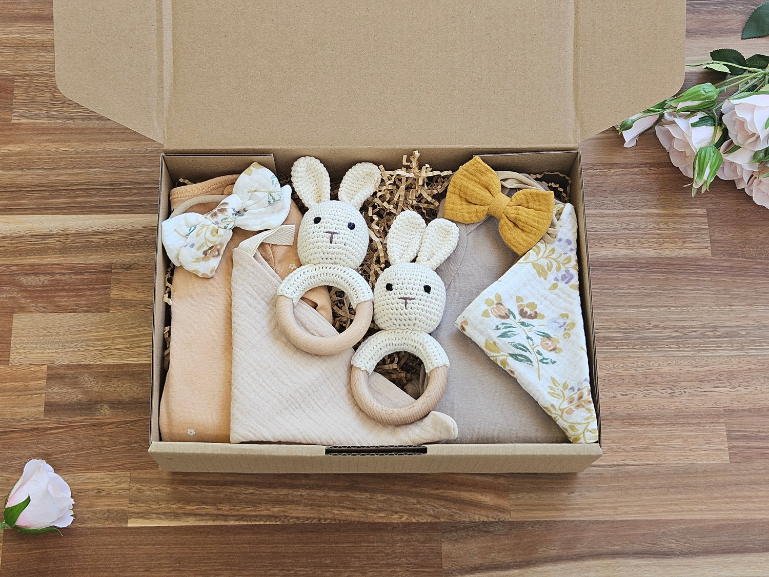 Gift box Includes
2 x Long sleeve cotton romper size 00
1 x Muslin Drool cloth
1 x Muslin Bandana Bib
2 x Muslin bow headbands
2 x Soft Crochet Rabbit rattle