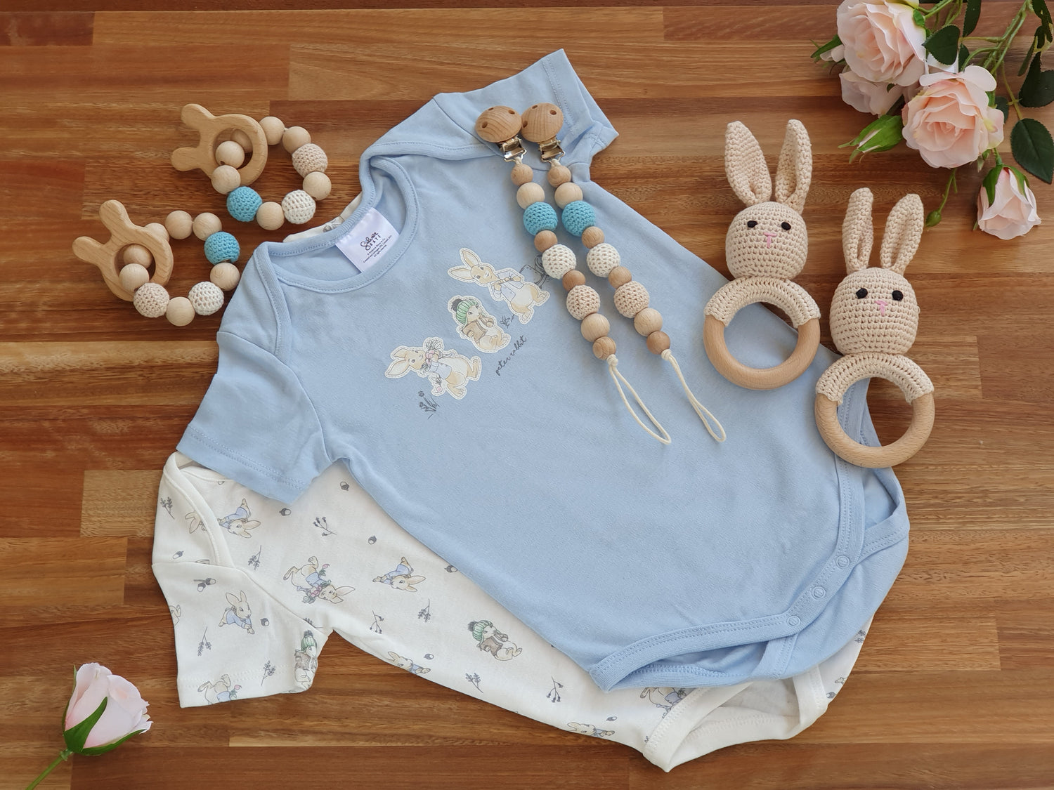 2 Peter Rabbit rompers, 2 beaded teether ring toy, 2 crochet rabbit rattles, 2 beaded pacifier clips